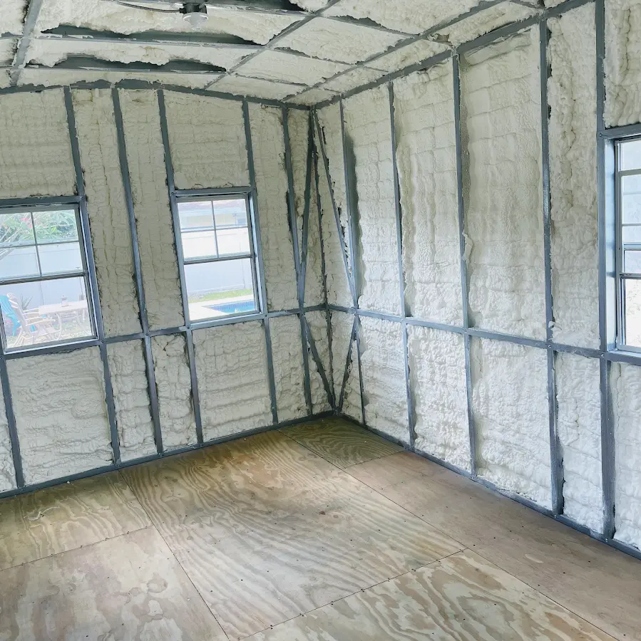 Closed-cell spray foam insulation applied to wall cavities in a residential project in Menifee